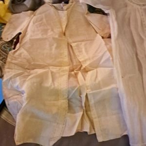 Antique christening gowns in a vintage hat box.  8 gowns in total.